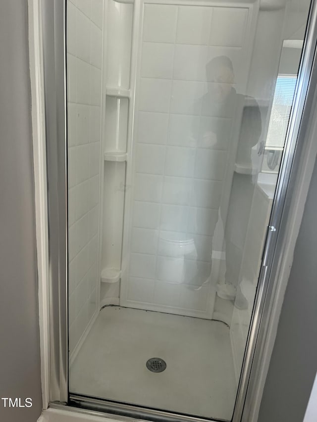 bathroom with walk in shower