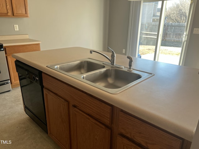 kitchen with dishwasher, sink, and light tile patterned floors