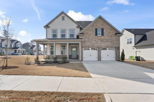 craftsman-style home featuring brick siding, a porch, a garage, a residential view, and driveway