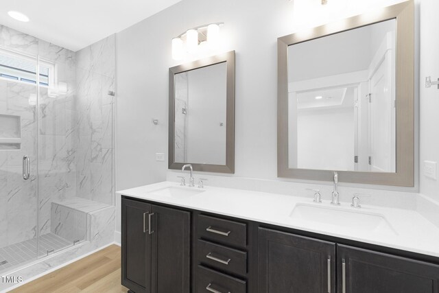 905 Myers Point Dr, Morrisville, NC 27560 - full bath with a marble finish shower, double vanity, and wood finished floors