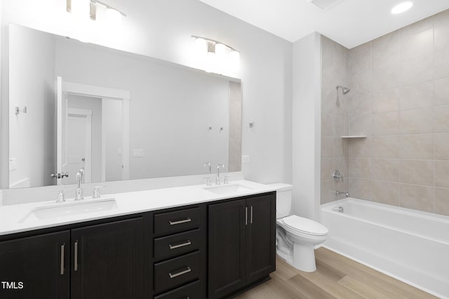 905 Myers Point Dr, Morrisville, NC 27560 - full bathroom featuring double vanity, wood finished floors, and shower / tub combination