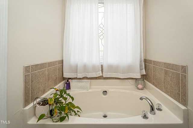 bathroom featuring a bath