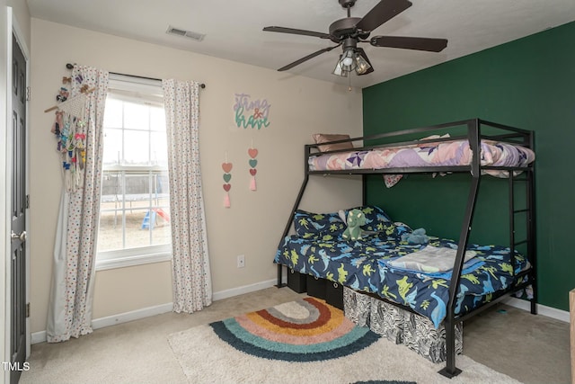 carpeted bedroom featuring ceiling fan