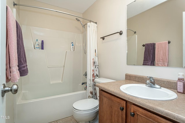 full bathroom featuring vanity, shower / bath combo with shower curtain, and toilet