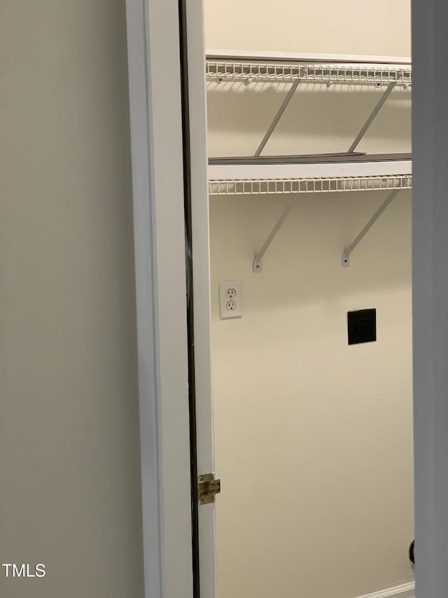 washroom with laundry area and electric dryer hookup