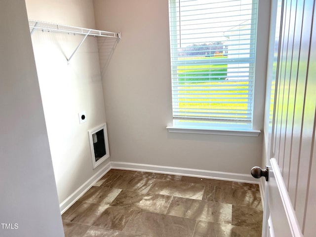 clothes washing area featuring hookup for an electric dryer