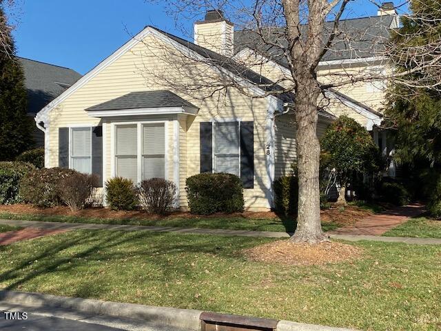 view of home's exterior with a yard