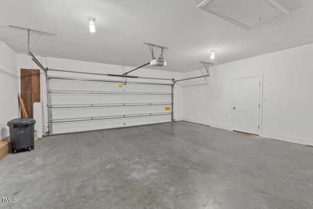 garage featuring a garage door opener