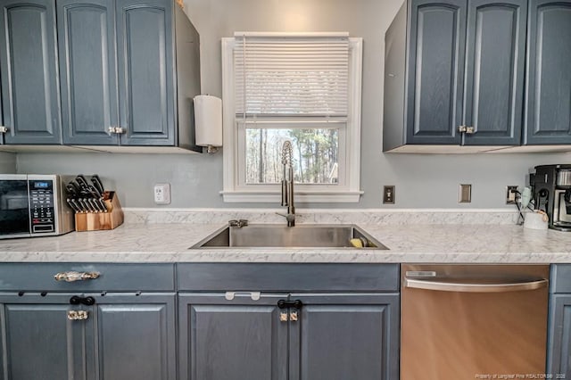 kitchen featuring appliances with stainless steel finishes and sink