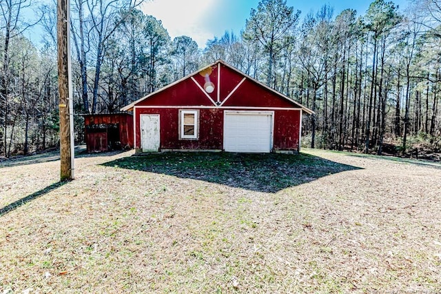 view of outdoor structure featuring a garage