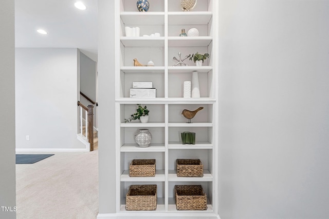 interior details with built in features, carpet floors, and recessed lighting