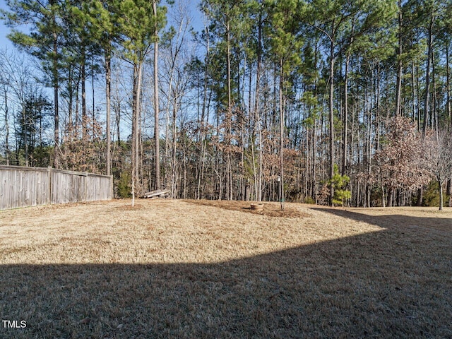 view of yard featuring fence