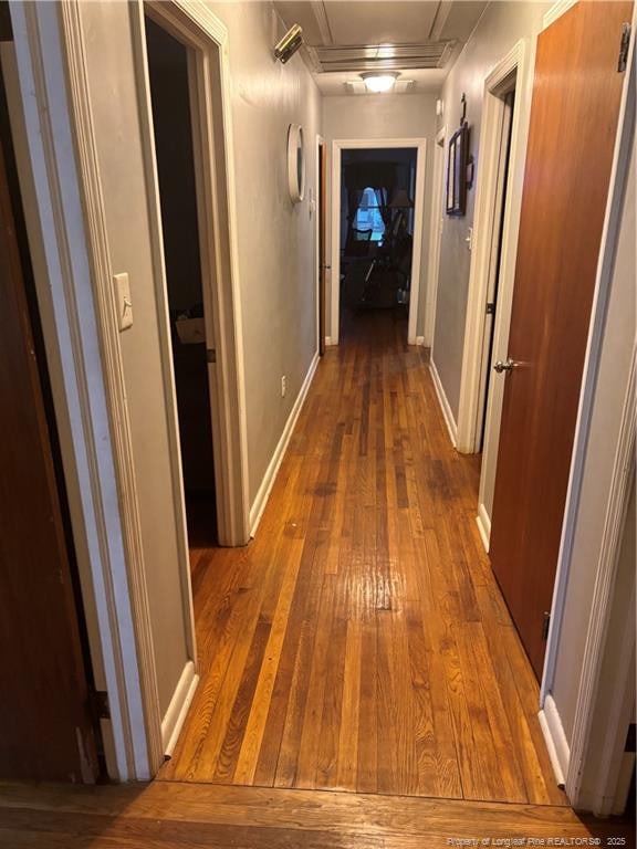 201 S Elm St, Maxton, NC 28364 - hallway featuring hardwood / wood-style floors and baseboards