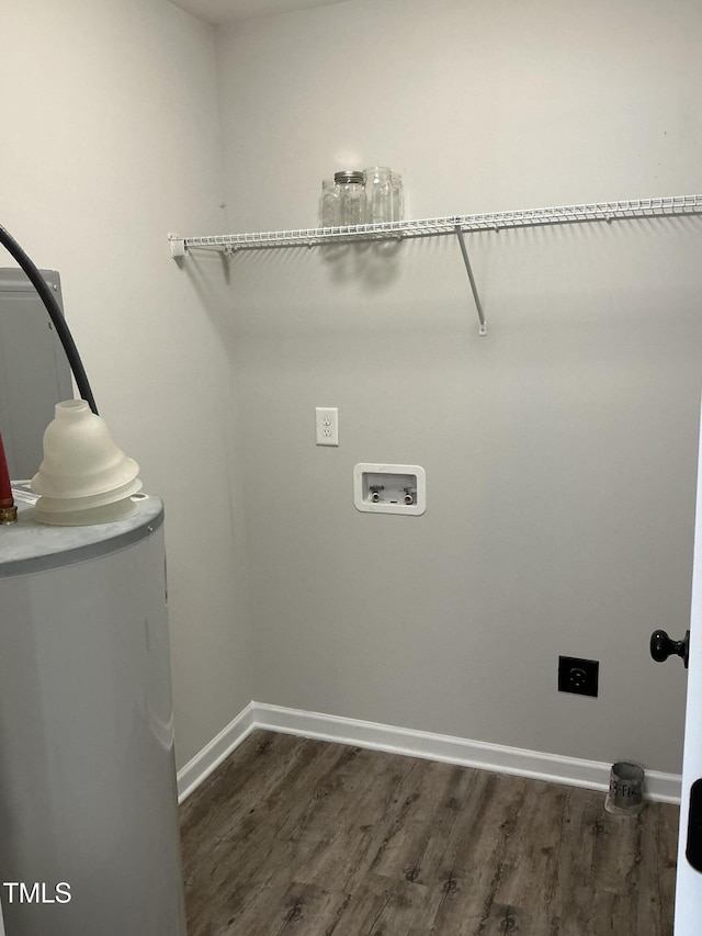 clothes washing area with washer hookup, dark hardwood / wood-style floors, and electric dryer hookup