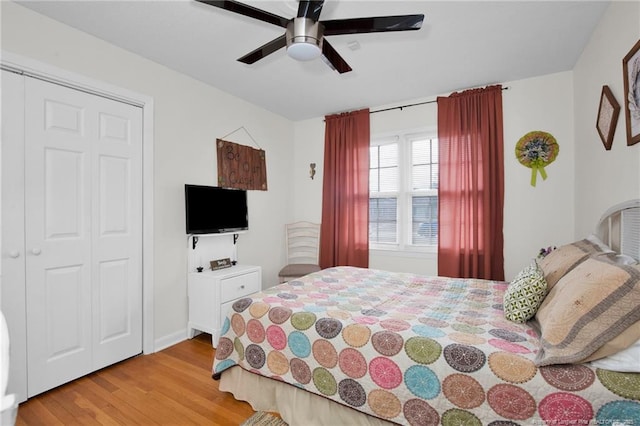 bedroom featuring ceiling fan and light hardwood / wood-style flooring