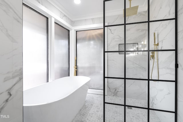 bathroom featuring a soaking tub and walk in shower