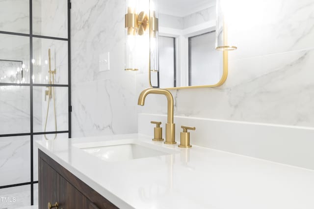 bathroom with tile walls and vanity