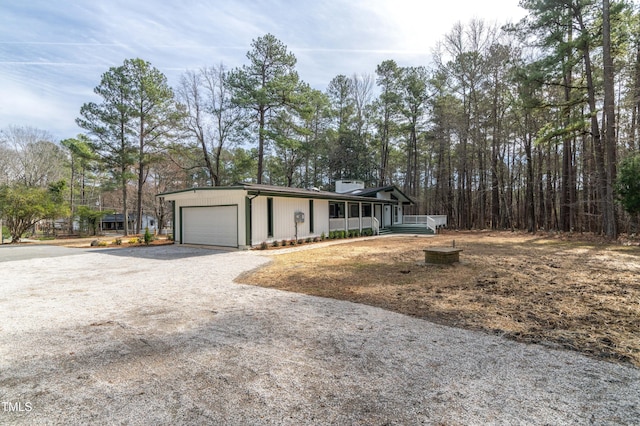 view of front of home with an attached garage and driveway