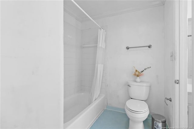 bathroom featuring crown molding, shower / tub combo with curtain, and toilet