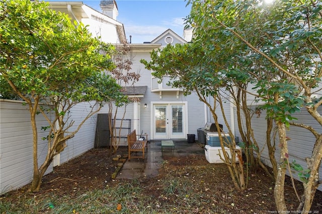 back of house with french doors