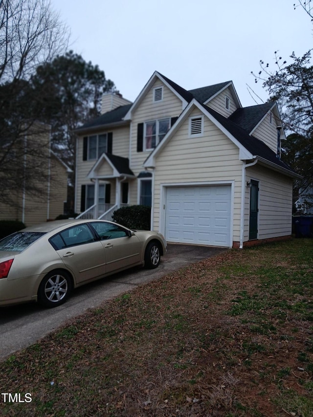 view of property with a garage