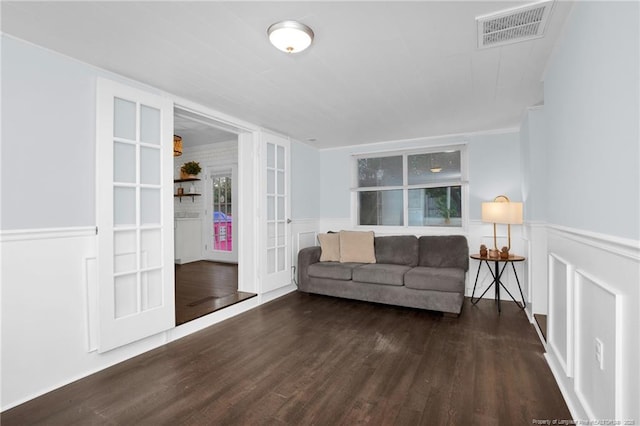 living room featuring dark hardwood / wood-style flooring