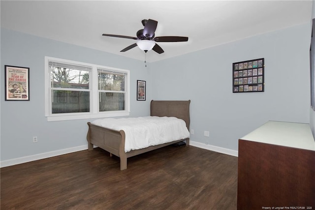 bedroom with dark wood-type flooring and ceiling fan