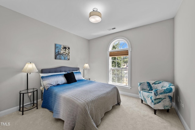 bedroom featuring carpet, visible vents, and baseboards