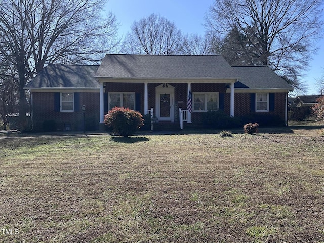 single story home with a porch and a front yard