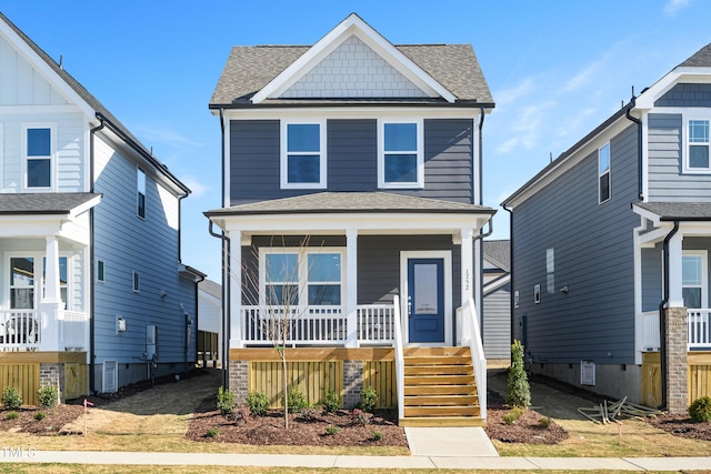 view of front of house featuring central AC unit and covered porch