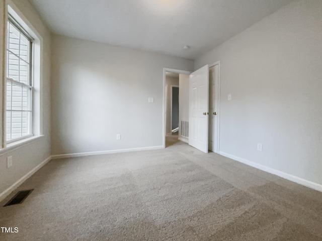 view of carpeted spare room