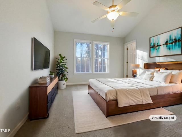 carpeted bedroom featuring lofted ceiling and ceiling fan