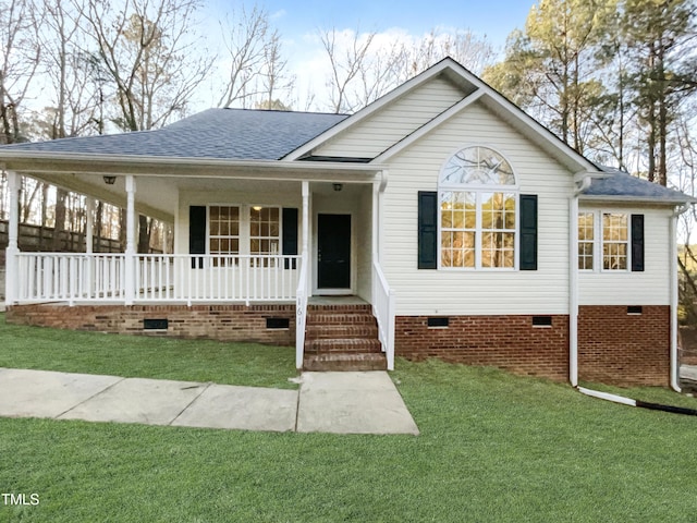 view of front of property with a front lawn and a porch