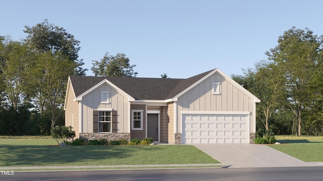 view of front of property featuring a garage and a front lawn