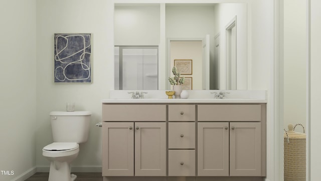 bathroom with vanity and toilet