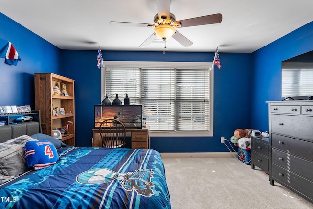 bedroom with light colored carpet and ceiling fan