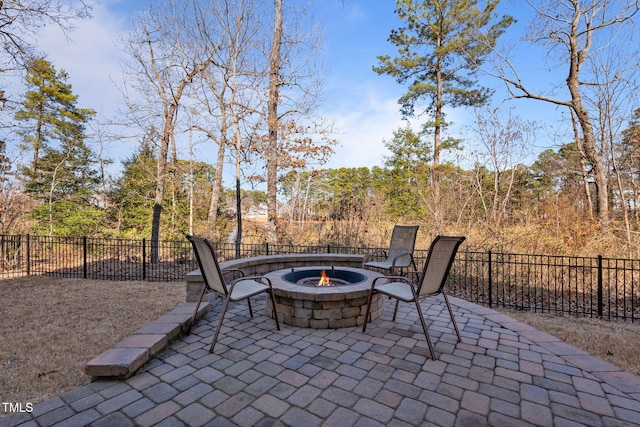 view of patio featuring a fire pit