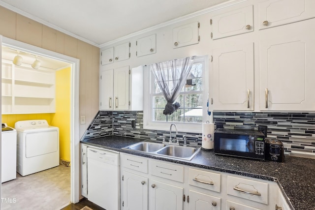 kitchen with ornamental molding, a sink, washing machine and dryer, black microwave, and dishwasher