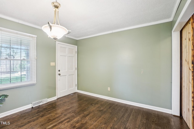 entryway with crown molding, baseboards, visible vents, and dark wood-style flooring