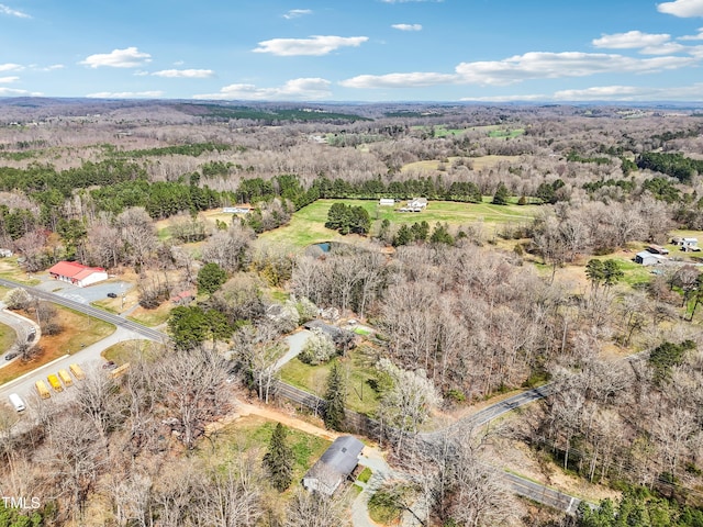 bird's eye view featuring a view of trees