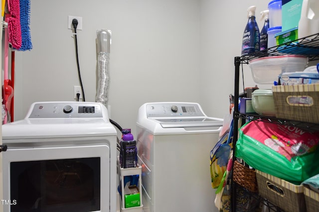 laundry area featuring laundry area and washer and clothes dryer