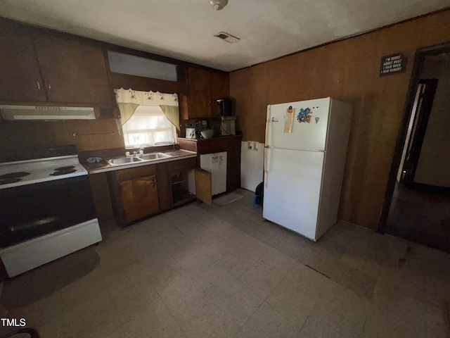 kitchen with white appliances, sink, and extractor fan