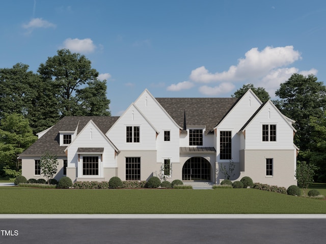 view of front of home featuring a front yard