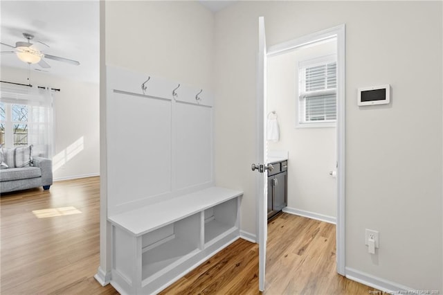 mudroom featuring ceiling fan and light wood-type flooring