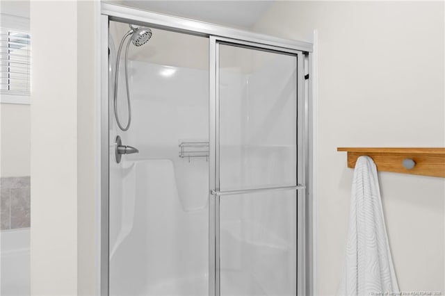 bathroom with an enclosed shower