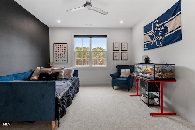 carpeted bedroom with ceiling fan