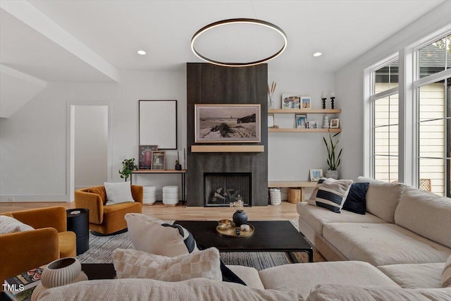 living room featuring hardwood / wood-style floors and a fireplace