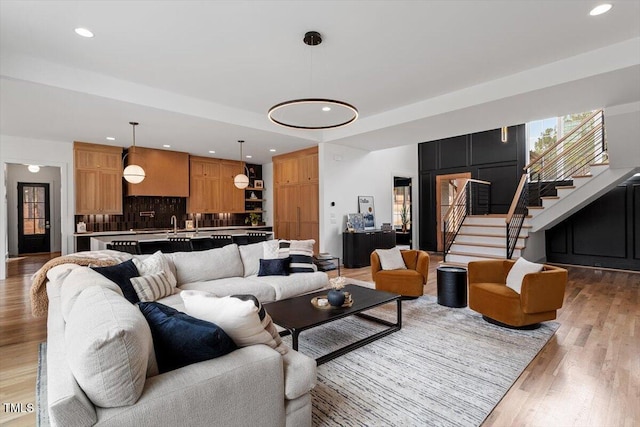 living room with light hardwood / wood-style flooring