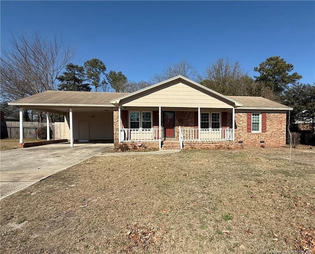 single story home with a front yard, a carport, and covered porch