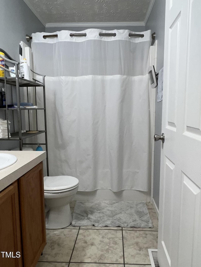 full bathroom featuring vanity, crown molding, toilet, and a textured ceiling